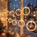 Гирлянда-штора Xmas 110L WW с кольцами и фигурками 3&times;0,7 м &bull; Светодиодная праздничная штора с 10 пластиковыми кольцами, теплым белым светом для окна, стены и витрины